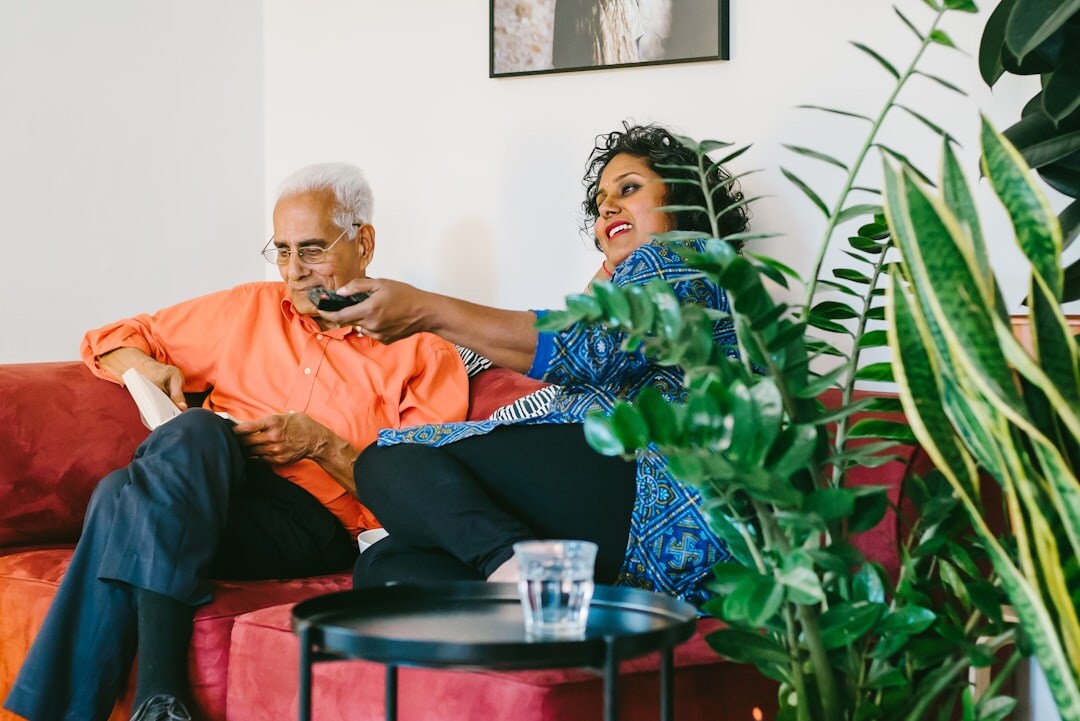 elderly watching tv