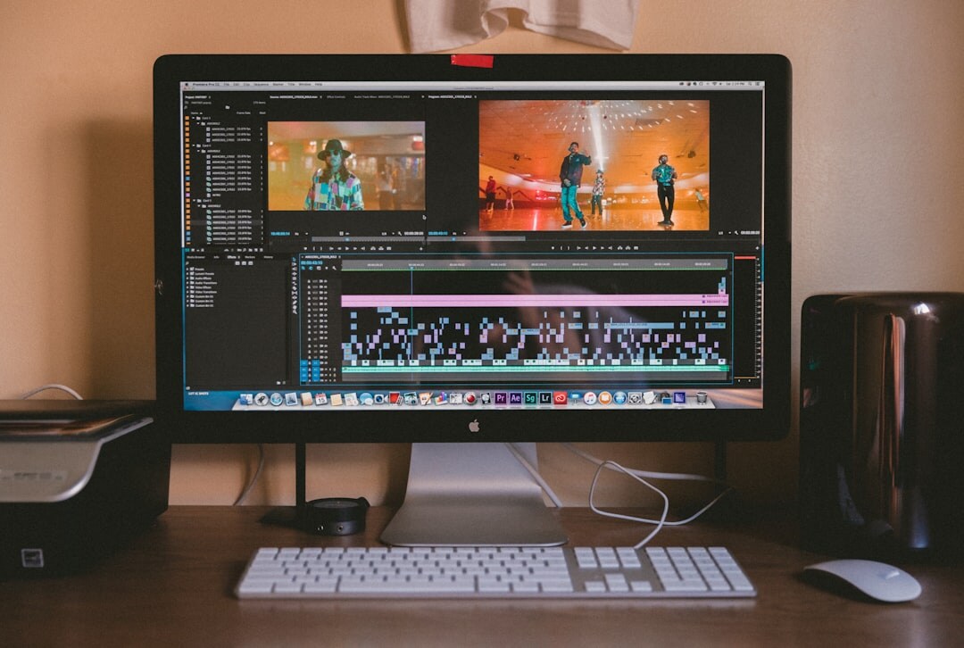 Video editing suite with multiple monitors showing timeline software